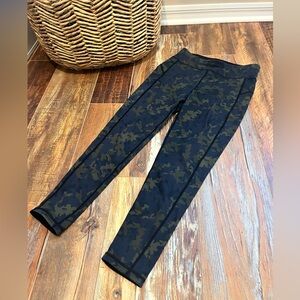 Sweaty Betty camouflage medium leggings, plain black on the inside.